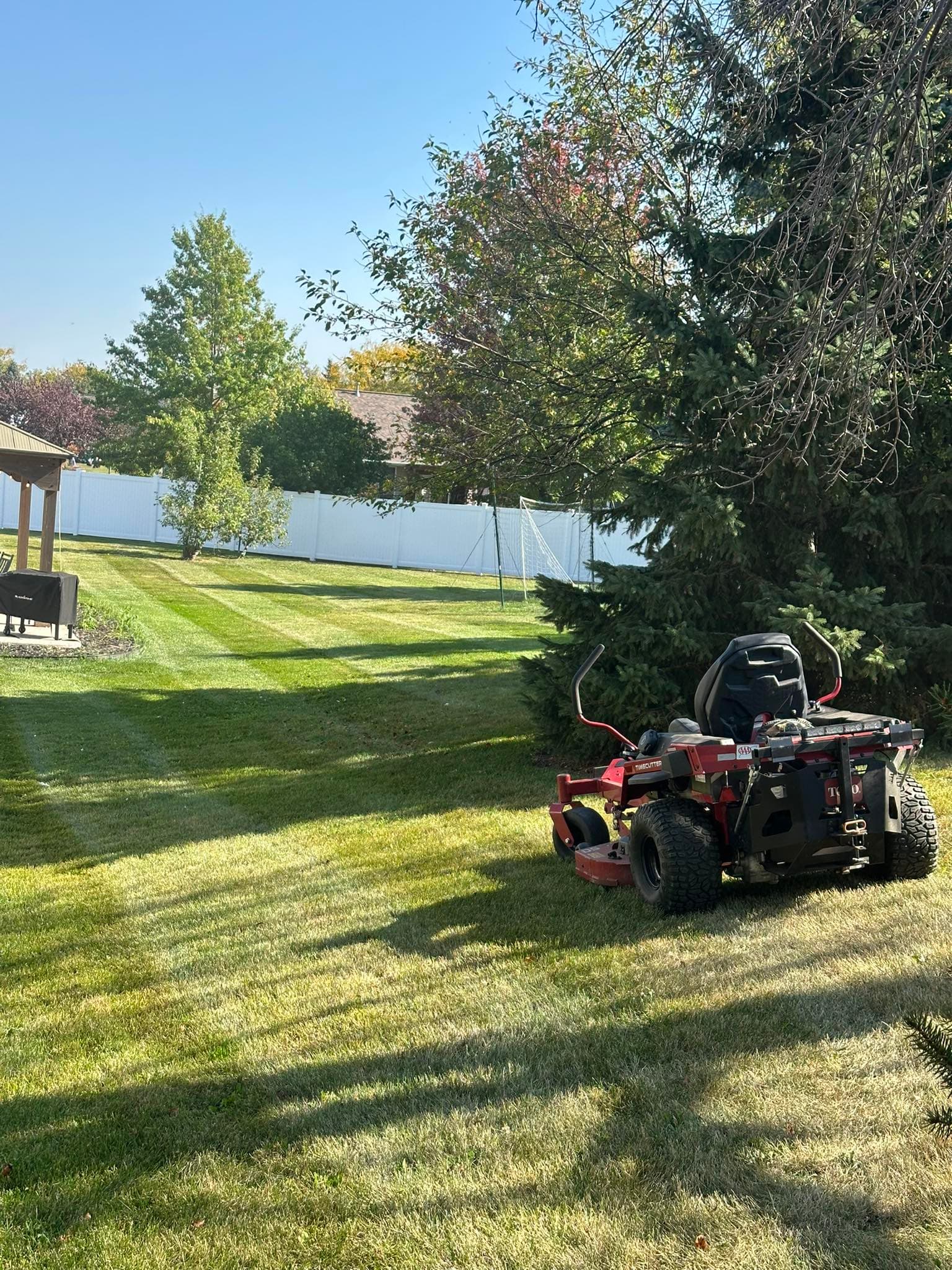 Professional lawn mowing in Green Bay, Wisconsin — quality equipment and healthy turf